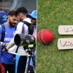 Virat Kohli igives signed bat to young cricketers